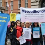 A group of people at a mesothelioma awareness event in London.