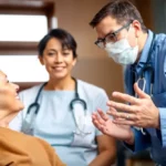 Doctor consulting with a mesothelioma patient about new treatment options.